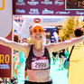 Athlete cheers at the finish line